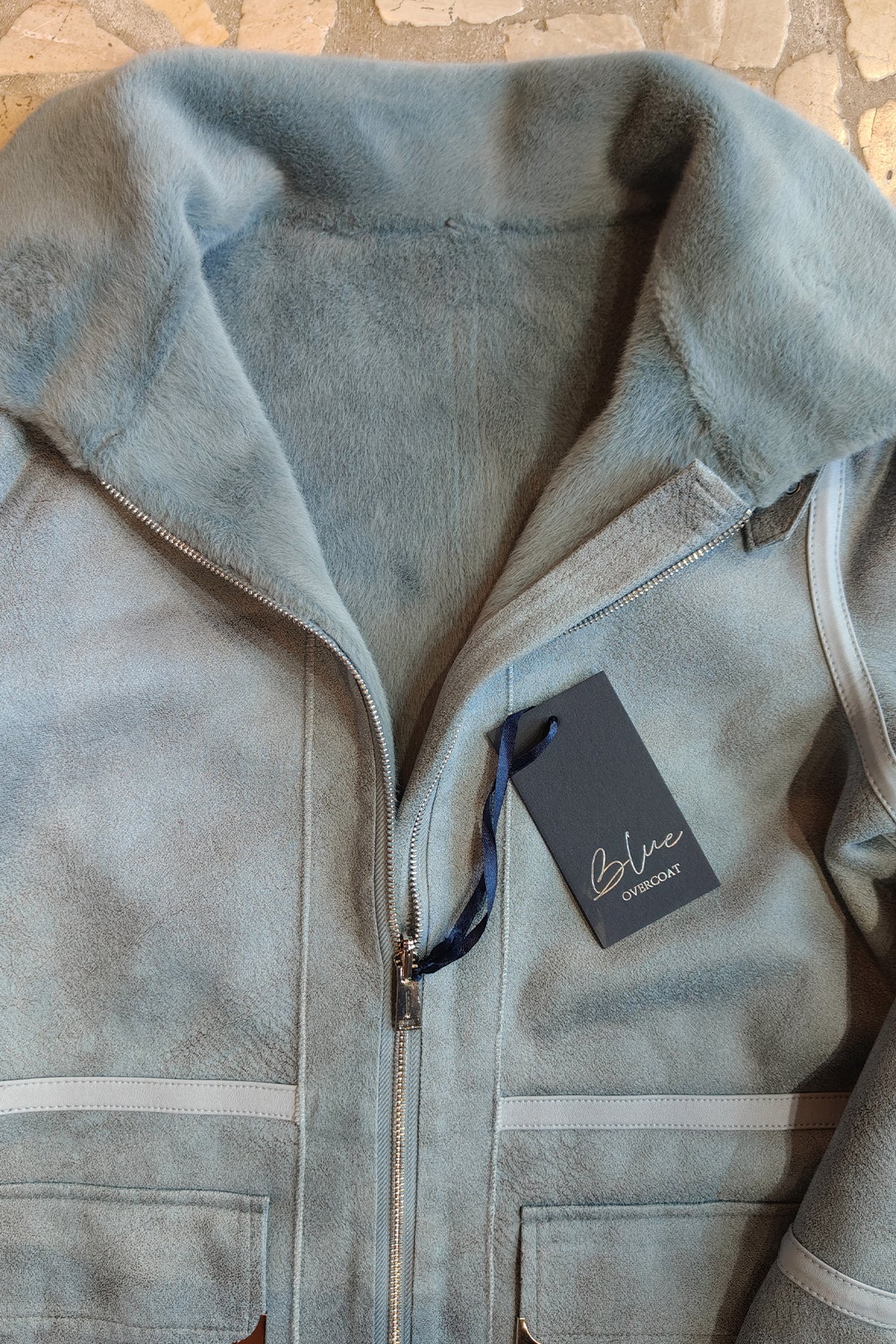 Cappotto reversibile in eco pelliccia