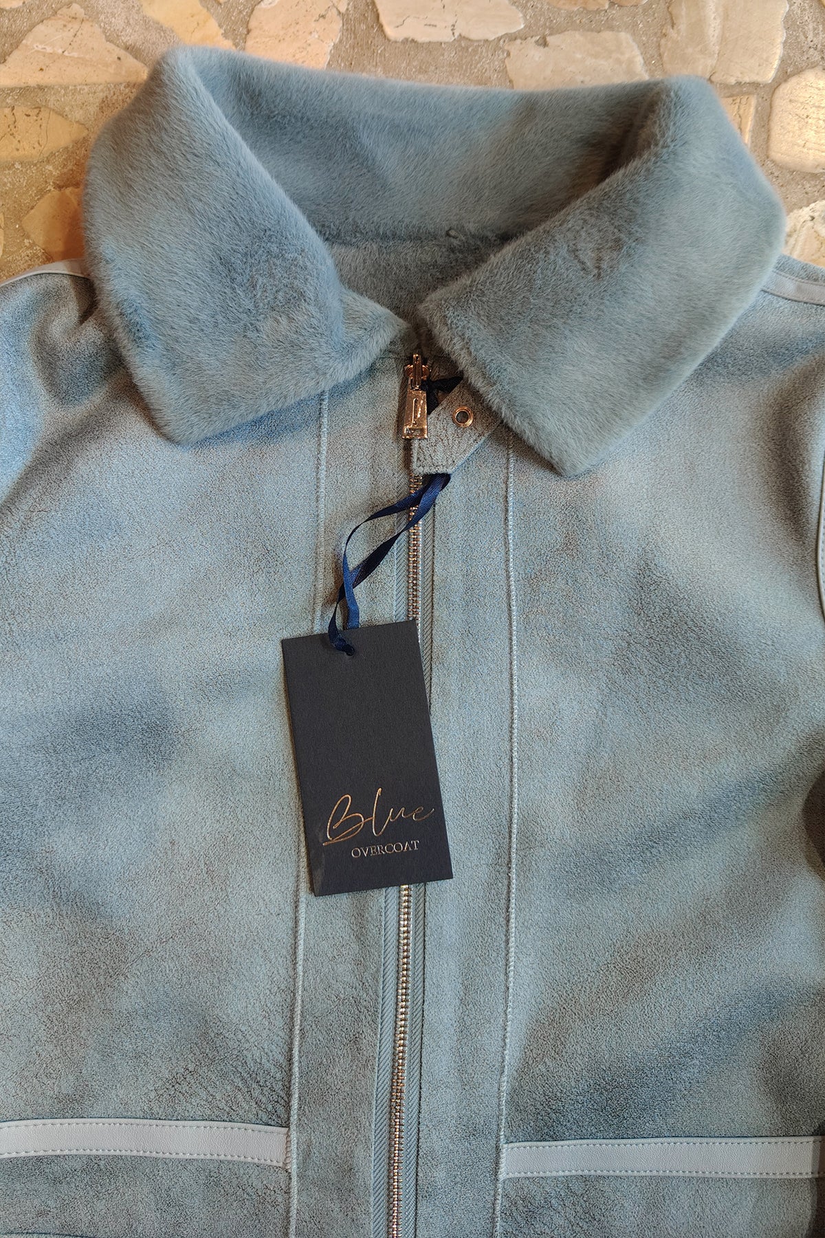Cappotto reversibile in eco pelliccia