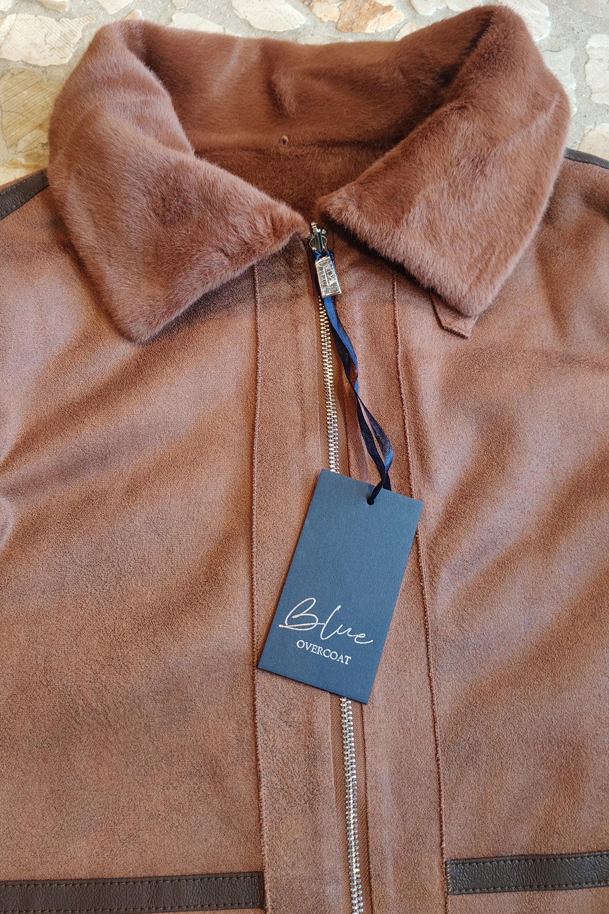 Cappotto reversibile in eco pelliccia