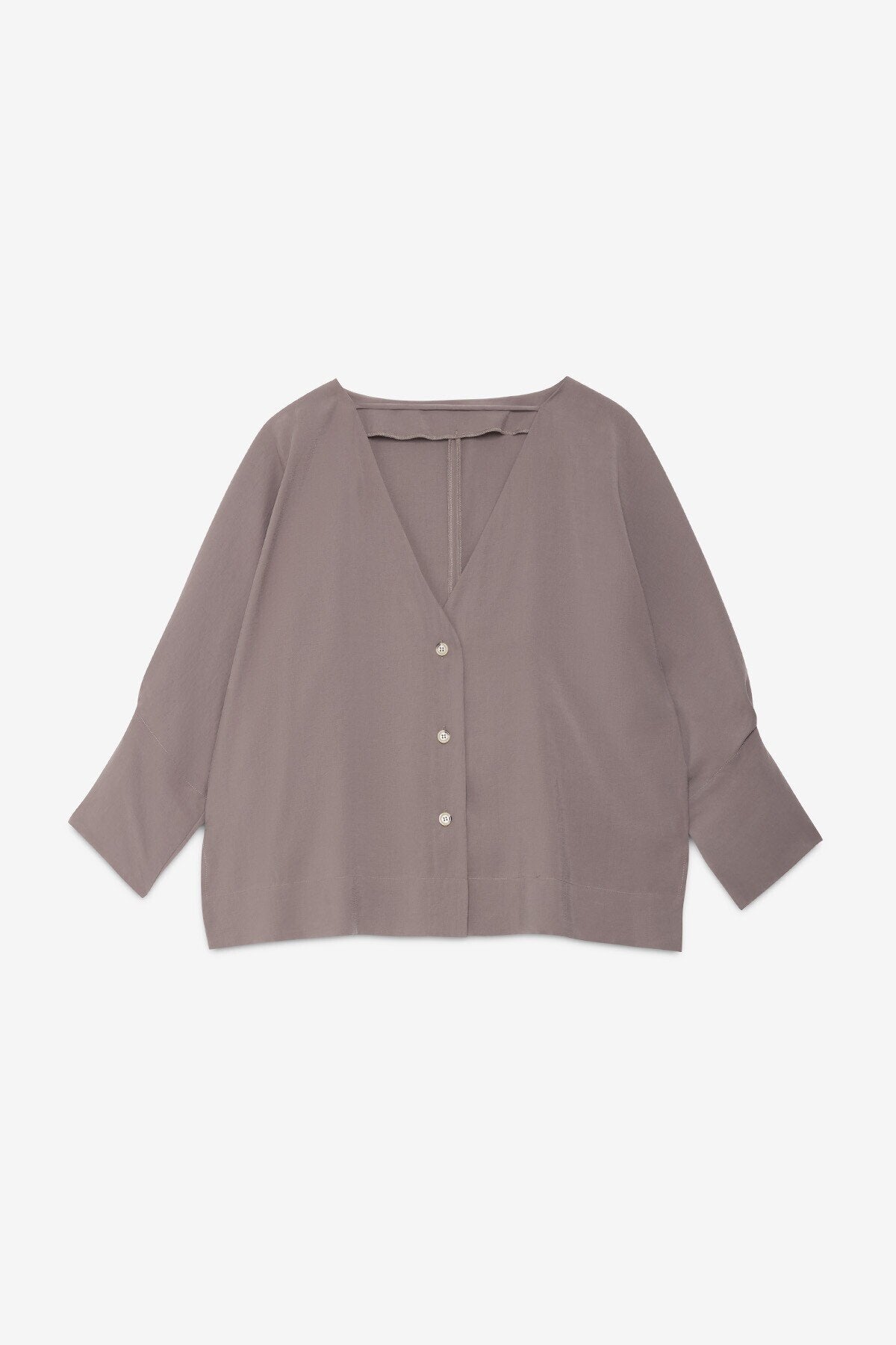 Blusa con scollo sul retro