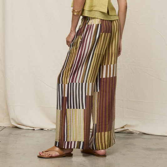 Pantaloni palazzo con disegno geometrico